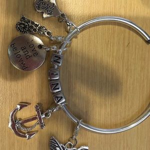 Love bracelets and charm necklaces